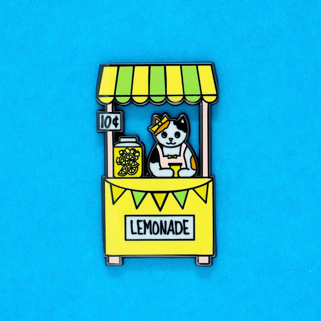 Lemonade stand cat enamel pin